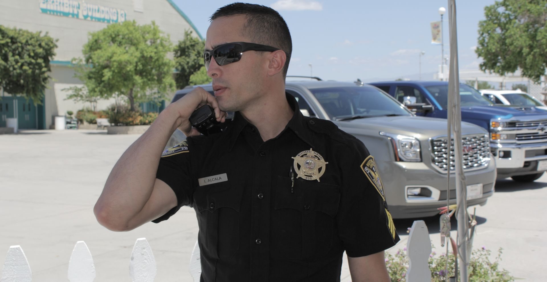 Westcoast Central patrol officer using a radio in Bakersfield